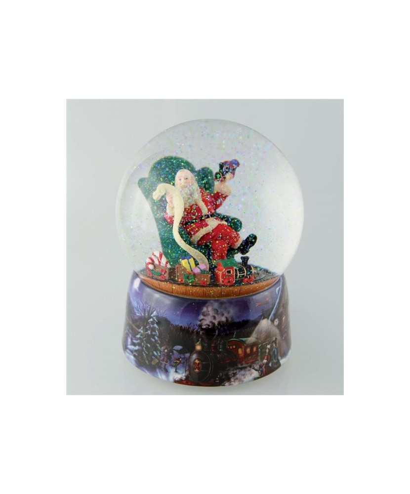 Pai Natal sentado com lista de desejos